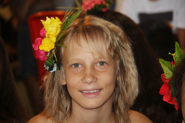 Girl with a flower decoration on the head