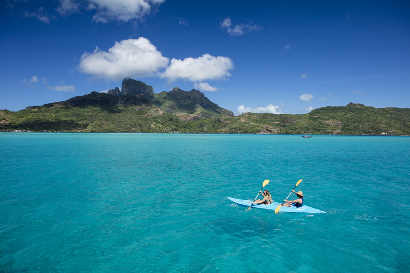 kayaking in front of bora bora mounteen